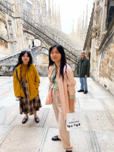 Three people on a cathedral terrace